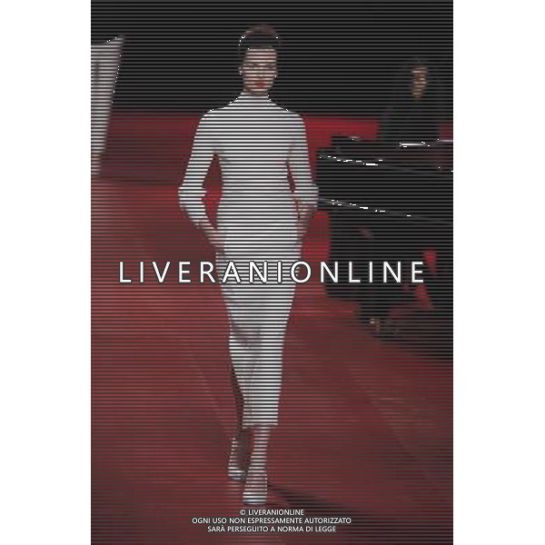 A model walks the runway during the Nina Ricci Fall/Winter 2013 Ready-to-Wear show as part of Paris Fashion Week on February 28, 2013 in Paris, France. ©Photoshot/AGENZIA ALDO LIVERANI SAS-ITALY ONLY - EDITORIAL USE ONLY