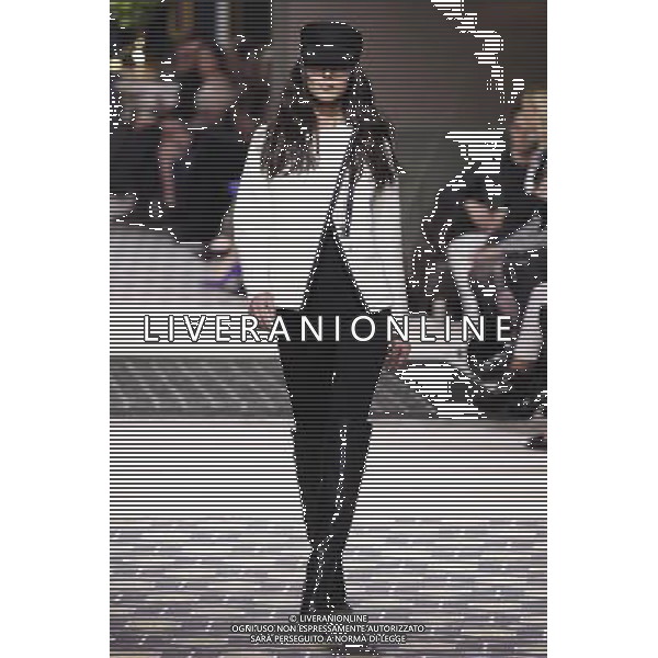 A model walks the runway during the H\'M Fall/Winter 2013/14 Ready-to-Wear show as part of Paris Fashion Week on February 27, 2013 in Paris, France. ©Photoshot/AGENZIA ALDO LIVERANI SAS-ITALY ONLY - EDITORIAL USE ONLY