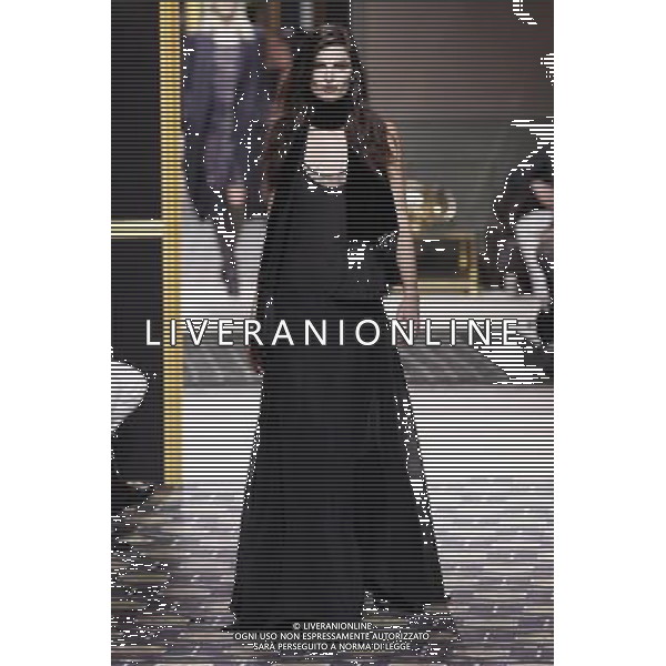 A model walks the runway during the H\'M Fall/Winter 2013/14 Ready-to-Wear show as part of Paris Fashion Week on February 27, 2013 in Paris, France. ©Photoshot/AGENZIA ALDO LIVERANI SAS-ITALY ONLY - EDITORIAL USE ONLY