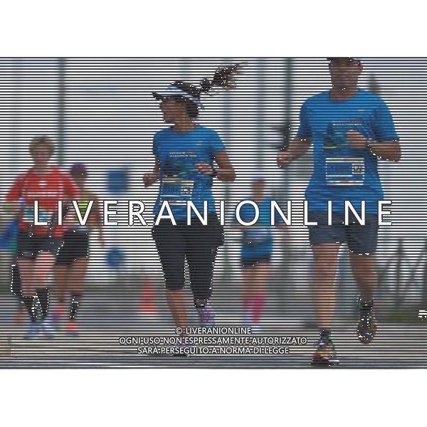 (130301) -- JERUSALEM, March 1, 2013 () -- Participants run during the Third Jerusalem International Marathon in Jerusalem, March 1, 2013. About 20,000 runners participated in a variety of races on Friday. (/ Yin Dongxun) ©photoshot/AGENZIA ALDO LIVERANI SAS - ITALY ONLY - Partecipanti alla Terza Maratona Internazionale di Gerusalemme, 1 marzo 2013. Circa 20.000 corridori hanno partecipato ad una serie di gare