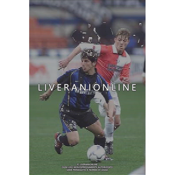 MILANO, 04-04-02 DFP/ MARCO LUSSOSO INTER-FEYENOORD (COPPA UEFA) NELLA FOTO: BELOZOGLU EMRE AG ALDO LIVERANI S A S