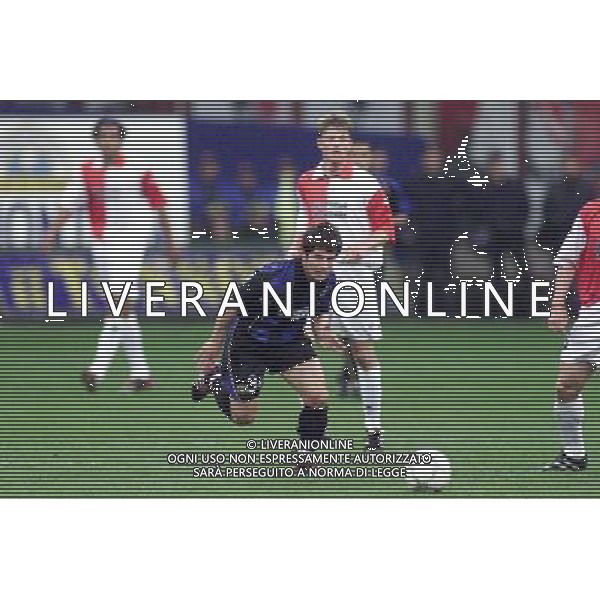 MILANO, 04-04-02 DFP/ MARCO LUSSOSO INTER-FEYENOORD (COPPA UEFA) NELLA FOTO: BELOZOGLU EMRE AG ALDO LIVERANI S A S