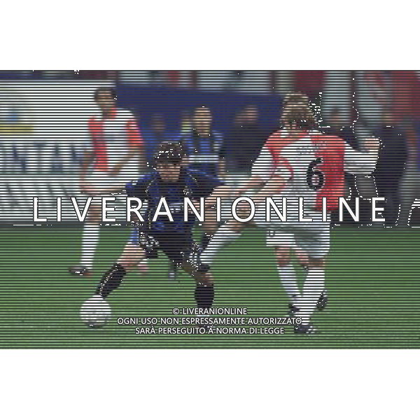 MILANO, 04-04-02 DFP/ MARCO LUSSOSO INTER-FEYENOORD (COPPA UEFA) NELLA FOTO: BELOZOGLU EMRE AG ALDO LIVERANI S A S