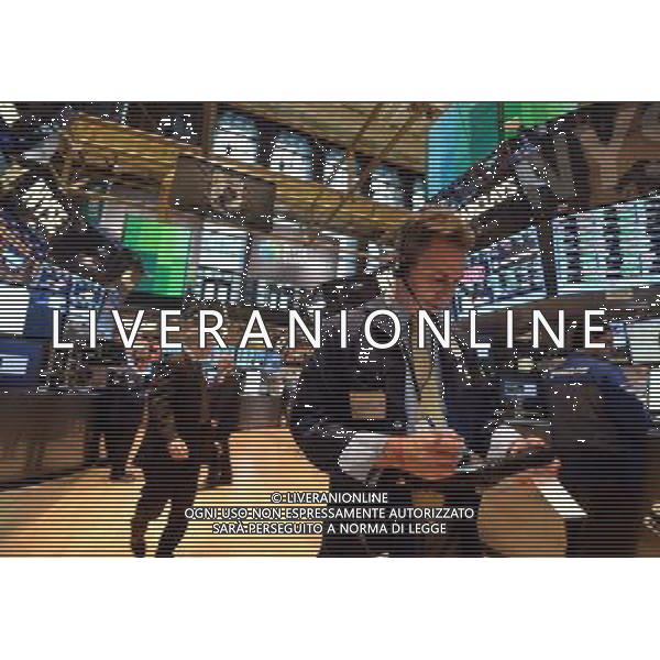(130308) -- NEW YORK, March 8, 2013 () -- Traders work on the floor of the New York Stock Exchange in New York, the United States, on March 8, 2013. The blue-chip Dow on Friday was up 67.58 points, or 0.47 percent, to 14,397.07. (/Wang Lei) AG ALDO LIVERANI S A S ONLY ITALY