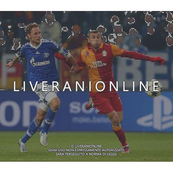UEFA Champions League second match between Schalke 04 and Galatasaray at Veltins arena in Gelsenkirchen, Germany 12.03.2013 Pictured: Burak Yilmaz of Galatasaray and Benedikt Hšwedes of Schalke 04. ©PHOTOSHOT/AGENZIA ALDO LIVERANI SAS - ITALY ONLY - EDITORIAL USE ONLY