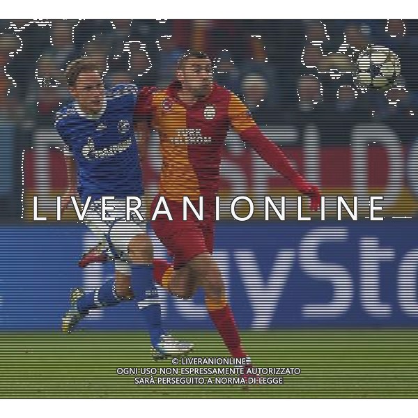 UEFA Champions League second match between Schalke 04 and Galatasaray at Veltins arena in Gelsenkirchen, Germany 12.03.2013 Pictured: Burak Yilmaz of Galatasaray and Benedikt Hšwedes of Schalke 04. ©PHOTOSHOT/AGENZIA ALDO LIVERANI SAS - ITALY ONLY - EDITORIAL USE ONLY