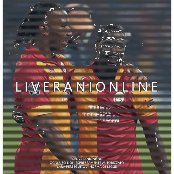 UEFA Champions League second match between Schalke 04 and Galatasaray at Veltins arena in Gelsenkirchen, Germany 12.03.2013 Match Scored: Schalke 04 (2) - Galatasaray (3) Pictured: Didier Drogba and Emmanuel Eboue of Galatasaray. ©PHOTOSHOT/AGENZIA ALDO LIVERANI SAS - ITALY ONLY - EDITORIAL USE ONLY