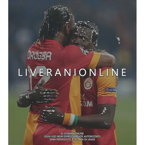 UEFA Champions League second match between Schalke 04 and Galatasaray at Veltins arena in Gelsenkirchen, Germany 12.03.2013 Match Scored: Schalke 04 (2) - Galatasaray (3) Pictured: Didier Drogba and Emmanuel Eboue of Galatasaray. ©PHOTOSHOT/AGENZIA ALDO LIVERANI SAS - ITALY ONLY - EDITORIAL USE ONLY