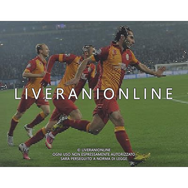 (130313) -- GELSENKIRCHEN, March 13, 2013 () -- Hamit Altintop (R) of Galatasaray celebrates during the UEFA Champions League eighth-final match against FC Schalke 04 at Veltins Arena in Gelsenkirchen, west Germany, March 12, 2013. Galatasaray won 3-2 and entered the quarterfinal.(/Ma Ning) (ql) cphotoshot/AGENZIA ALDO LIVERANI SAS - ITALY ONLY - EDITORIAL USE ONLY