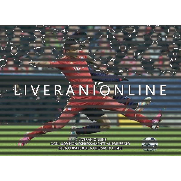 (130314) -- MUNICH, March 14, 2013 () -- Luiz Gustavo of FC Bayern Munich vies with Tomas Rosicky (Front) of Arsenal FC during the UEFA Champions League eighth-final match at Allianz Arena in Munich, south Germany, March 13, 2013. Bayern Munich lost 0-2 but entered the quarterfinal. (/Ma Ning) (ql) ©photoshot /AGENZIA ALDO LIVERANI SAS - ITALY ONLY - BAYERN MONACO FC-ARSENAL FC UEFA Champions League ritorno ottavi di finale a Allianz Arena a Monaco di Baviera, sud della Germania, 13 marzo 2013.