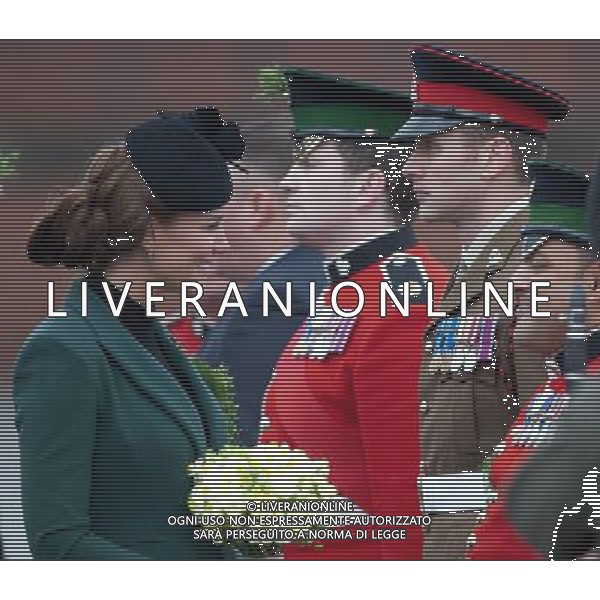 The Duke and Duchess of Cambridge visit the 1st Battalion Irish Guards at the St Patrickês Day Parade at Mons Barracks, Aldershot, Hampshire, UK. The Duke of Cambridge attended the Parade as Colonel of the Regiment. Her Royal Highness presented the traditional sprigs of shamrocks to the Officers and Guardsmen of the Regiment. 17-3-2013 ©photoshot/AGENZIA ALDO LIVERANI SAS - ITALY ONLY - REALI INGLESI: Il principe William d\'inghilterra con la moglie kate middleton in visita al 1mo battaglione delle Guardie irlandesi alla parata nel giorno di san patrizio, Hampshire, Regno Unito 17 marzo 2013 