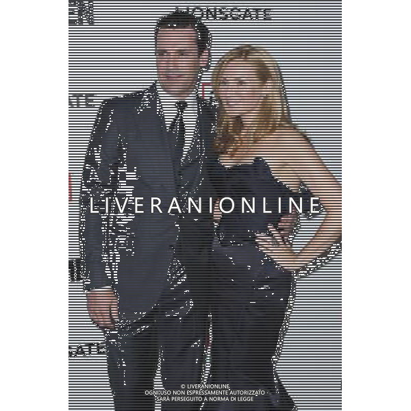 LOS ANGELES, CA - MARCH 20: Jon Hamm and Jennifer Westfeldt at the \'Mad Men\' Season 6 Los Angeles Premiere held at the Director\'s Guild of America on March 20, 2013 in Los Angeles, California. Credit: MediaPunch Inc. PREMIERA SERIAL MAD MEN SEZON 6 FOT. MEDIAPUNCH/NEWSPIX.PL US, FRANCE AND GERMANY OUT !!! --- Newspix.pl /AGENZIA ALDO LIVERANI SAS/ITALY ONLY - EDITORIAL USE ONLY *** Local Caption *** www.newspix.pl mail us: info@newspix.pl call us: 0048 022 23 22 222 --- Polish Picture Agency by Ringier Axel Springer Poland