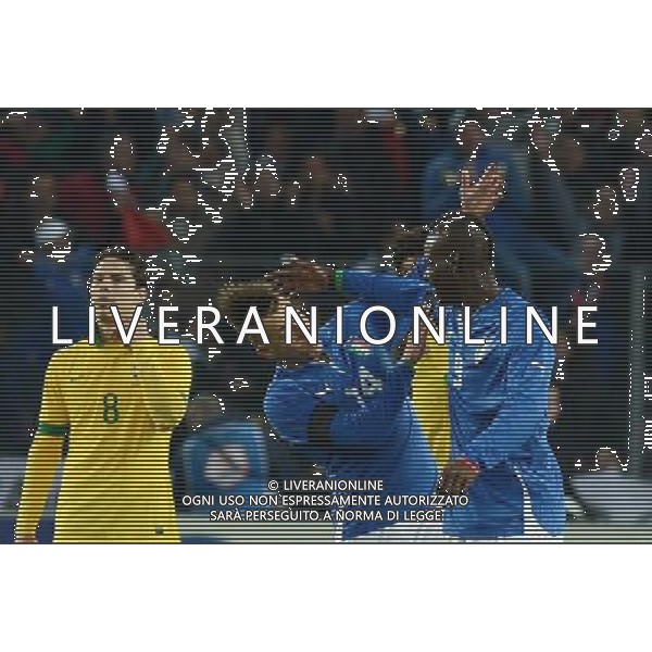 (130322) -- GENEVA, March 22, 2013 () -- Italy\'s Mario Balotelli (1st R) celebrates scoring with teammate El Shaarawy Stephan during the international friendly soccer match against Brazil in Geneva, Switzerland, March 21, 2013. The match ended with a 2-2 tie. (/Wang Siwei) AG ALDO LIVERANI S A S ONLY ITALY