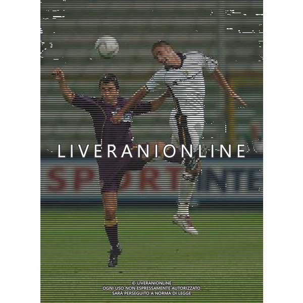 Parma 16-09-2004 Coppa UEFA 2004/05 Parma-Maribor 3:2 nella foto cannavaro e bozgo ph marco Luzzani/ag aldo liverani s.a.s.
