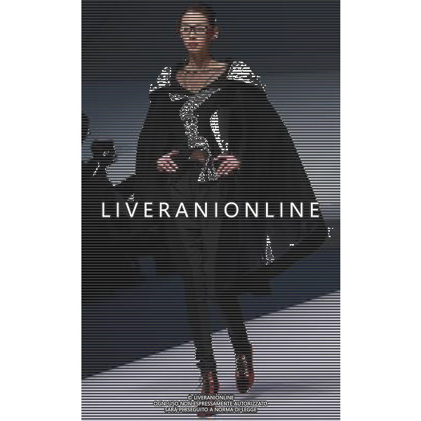 (130325) -- BEIJING, March 25, 2013 () -- A model presents a creation of designers attending the 21st China International Young Fashion Designers Contest in Beijing, capital of China, March 25, 2013. The contest theming Boundary has attracted 29 designers from 16 countries. (/Li Mingfang) (zc) ©Photoshot/AGENZIA ALDO LIVERANI SAS-ITALY ONLY - EDITORIAL USE ONLY