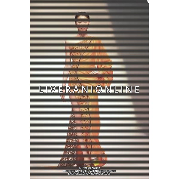 (130325) -- BEIJING, March 25, 2013 () -- A model presents a creation of designers attending the 21st China International Young Fashion Designers Contest in Beijing, capital of China, March 25, 2013. The contest theming Boundary has attracted 29 designers from 16 countries. (/Li Xin) (cxy) ©Photoshot/AGENZIA ALDO LIVERANI SAS-ITALY ONLY - EDITORIAL USE ONLY