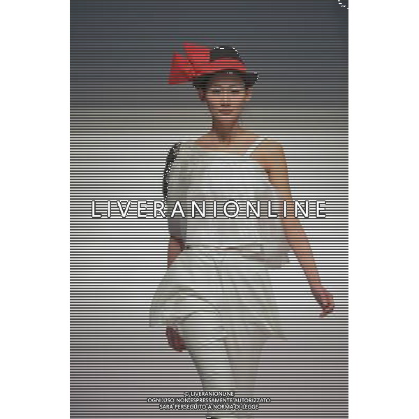 (130325) -- BEIJING, March 25, 2013 () -- A model presents a creation of designers attending the 21st China International Young Fashion Designers Contest in Beijing, capital of China, March 25, 2013. The contest theming Boundary has attracted 29 designers from 16 countries. (/Li Xin) (cxy) ©Photoshot/AGENZIA ALDO LIVERANI SAS-ITALY ONLY - EDITORIAL USE ONLY