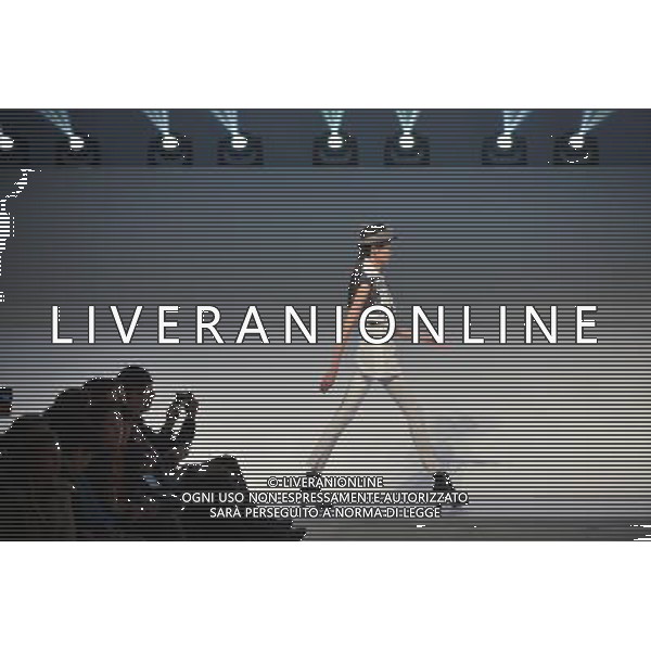 (130325) -- BEIJING, March 25, 2013 () -- A model presents a creation of designers attending the 21st China International Young Fashion Designers Contest in Beijing, capital of China, March 25, 2013. The contest theming Boundary has attracted 29 designers from 16 countries. (/Li Xin) (cxy) ©Photoshot/AGENZIA ALDO LIVERANI SAS-ITALY ONLY - EDITORIAL USE ONLY