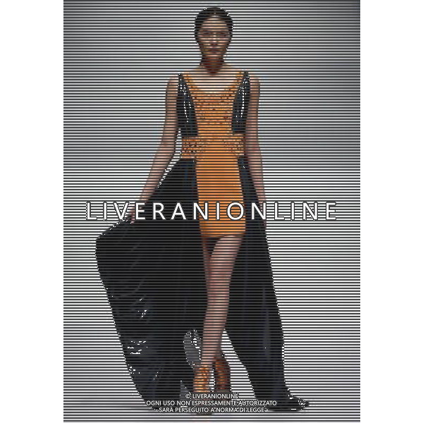 (130326) -- BEIJING, March 26, 2013 () -- A model presents a creation by designer Liu Wei during the opening ceremony of the China Fashion Week in Beijing, capital of China, March 25, 2013. (/Chen Jianli) (whj) ©Photoshot/AGENZIA ALDO LIVERANI SAS-ITALY ONLY - EDITORIAL USE ONLY