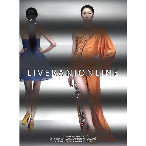 (130326) -- BEIJING, March 26, 2013 () -- Models present creations by designer Liu Wei during the opening ceremony of the China Fashion Week in Beijing, capital of China, March 25, 2013. (/Chen Jianli) (whj) ©Photoshot/AGENZIA ALDO LIVERANI SAS-ITALY ONLY - EDITORIAL USE ONLY