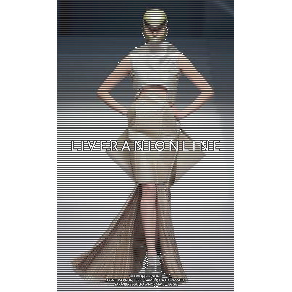 (130326) -- BEIJING, March 26, 2013 () -- A model presents a creation at the 21st China International Young Fashion Designers Contest during the China Fashion Week in Beijing, capital of China, March 25, 2013. Wang Zhixian won the gold medal at the contest. (/Chen Jianli) (ry) ©Photoshot/AGENZIA ALDO LIVERANI SAS-ITALY ONLY - EDITORIAL USE ONLY