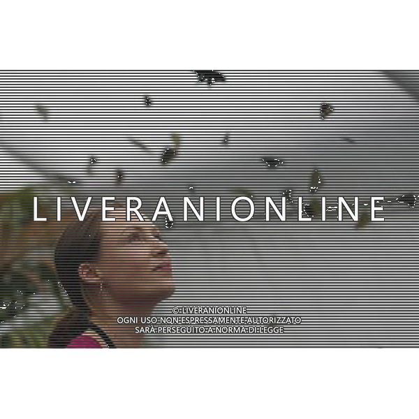 A woman looks on butterfly in the \'Sensational Butterflies\' exhibition at the Natural History Museum on 25 March, 2013 in London, Britain. The live, tropical butterfly house will be stationed on the Natural History Museum\'s east lawn from March 29, 2013 until September 15, 2013. ©Photoshot/AGENZIA ALDO LIVERANI SAS-ITALY ONLY - EDITORIAL USE ONLY