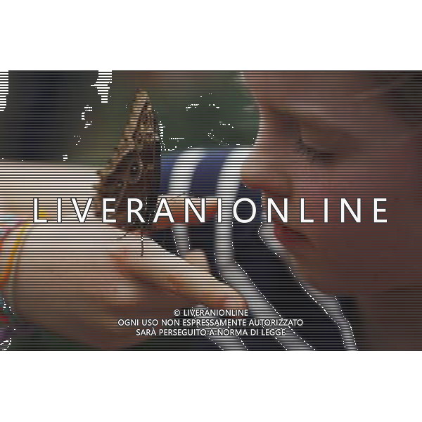 A butterfly lands on a girl hand in the \'Sensational Butterflies\' exhibition at the Natural History Museum on 25 March, 2013 in London, Britain. The live, tropical butterfly house will be stationed on the Natural History Museum\'s east lawn from March 29, 2013 until September 15, 2013. ©Photoshot/AGENZIA ALDO LIVERANI SAS-ITALY ONLY - EDITORIAL USE ONLY