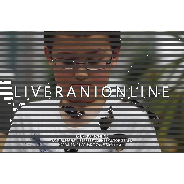 A butterfly lands on a boy in the \'Sensational Butterflies\' exhibition at the Natural History Museum on 25 March, 2013 in London, Britain. The live, tropical butterfly house will be stationed on the Natural History Museum\'s east lawn from March 29, 2013 until September 15, 2013. ©Photoshot/AGENZIA ALDO LIVERANI SAS-ITALY ONLY - EDITORIAL USE ONLY