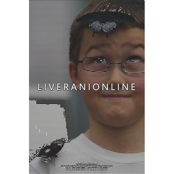 A butterfly lands on a boy face in the \'Sensational Butterflies\' exhibition at the Natural History Museum on 25 March, 2013 in London, Britain. The live, tropical butterfly house will be stationed on the Natural History Museum\'s east lawn from March 29, 2013 until September 15, 2013. ©Photoshot/AGENZIA ALDO LIVERANI SAS-ITALY ONLY - EDITORIAL USE ONLY