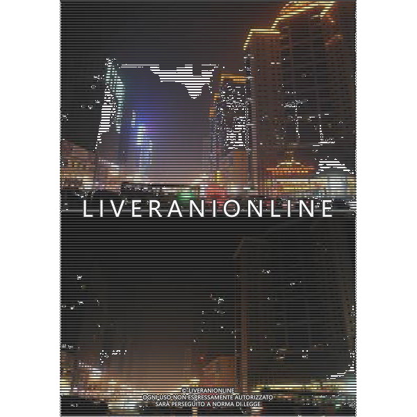 (130323) -- SHIJIAZHUANG, March 23, 2013 () -- The combo buildings in the Guang\'an Street in Shijiazhuang, capital of north China\'s Hebei Province, before (up) and after turning off their lights to mark the annual \'Earth Hour\' event, March 23, 2013. (/Wang Xiao) (zn) ©Photoshot/AGENZIA ALDO LIVERANI SAS-ITALY ONLY - EDITORIAL USE ONLY