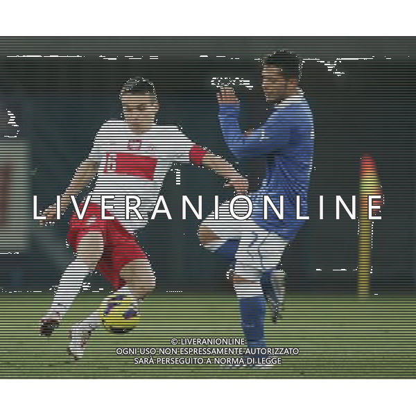 GLIWICE STADION MIEJSKI PRZY ULICY OKRZEI 27.03.2013 PILKA NOZNA 12 TURNIEJ CZTERECH NARODOW POLSKA U20 - WLOCHY U20 NZ SZYMON DREWNIAK POL GIANLUCA CAPRARI ITA FOT MICHAL NOWAK / NEWSPIX.PL GLIWICE 27.03.2013 FOOTBALL 12TH FOUR NATIONS TOURNAMENT POLAND U20 - ITALY U20 SZYMON DREWNIAK POL GIANLUCA CAPRARI ITA MICHAL NOWAK / NEWSPIX.PL --- Newspix.pl AG ALDO LIVERANI S A S ONLY ITALY *** Local Caption *** www.newspix.pl mail us: info@newspix.pl call us: 0048 022 23 22 222 --- Polish Picture Agency by Ringier Axel Springer Poland