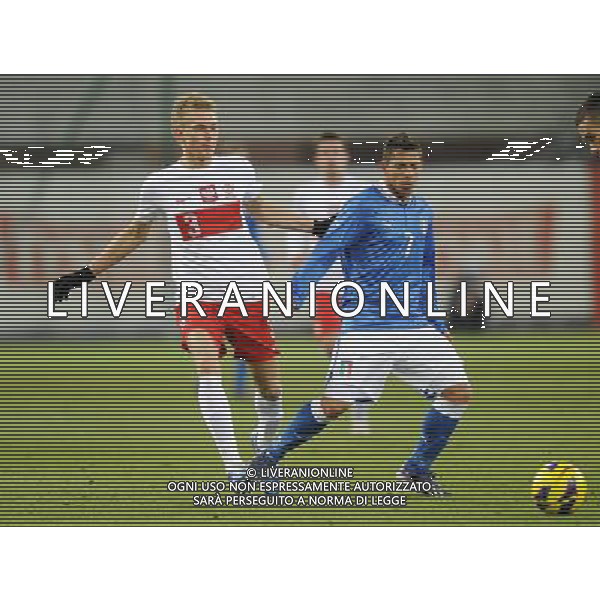 27.03.2013 GLIWICE PILKA NOZNA TURNIEJ CZTERECH NARODOW U20 POLSKA - U20 WLOCHY FOUR NATIONS TOURNAMENT 2012/2013 U20 POLAND - U20 ITALY N/Z MICHAL KOLODZIEJSKI GIANLUCA CAPRARI FOTO NORBERT BARCZYK / PRESSFOCUS NEWSPIXPL --- Newspix.pl AG ALDO LIVERANI S A S ONLY ITALY *** Local Caption *** www.newspix.pl mail us: info@newspix.pl call us: 0048 022 23 22 222 --- Polish Picture Agency by Ringier Axel Springer Poland