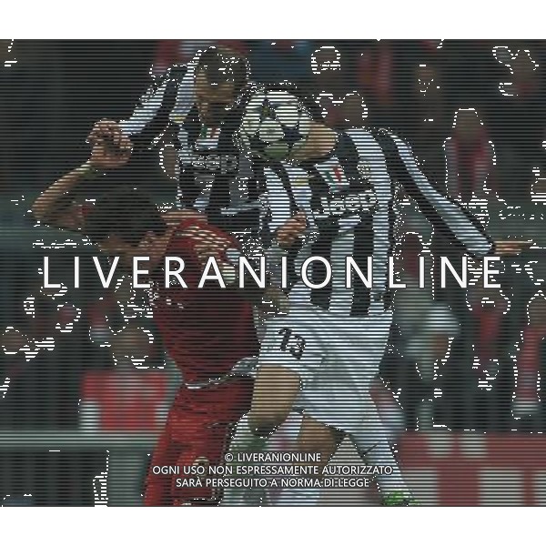UEFA Champions League 2012/2013 Quarti di Finale Ritorno Monaco di Baviera (Germania) - 02.04.2013 Bayern Monaco-Juventus Nella Foto:chiellini e peluso fermano mandzukic /Ph.Vitez-Ag. Aldo Liverani