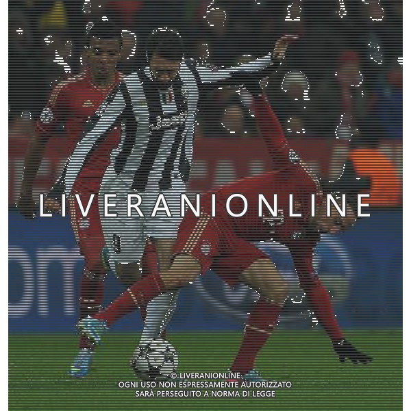 UEFA Champions League 2012/2013 Quarti di Finale Ritorno Monaco di Baviera (Germania) - 02.04.2013 Bayern Monaco-Juventus Nella Foto:vucinic fermato da ribery /Ph.Vitez-Ag. Aldo Liverani
