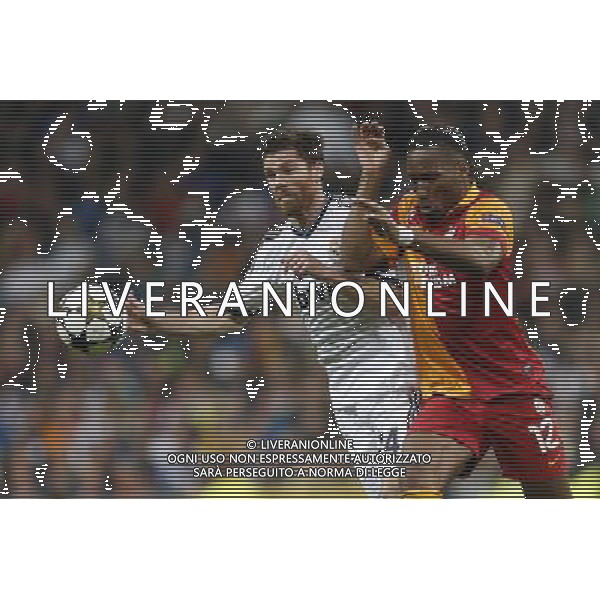 Real Madrid\'s Xabi Alonso and Galatasaray\'s Didier Drogba during quarter finals CHampions League match on March 3rd 2013. Photo: Cesar Cebolla / ALFAQUI AG ALDO LIVERANI S A S ONLY ITALY