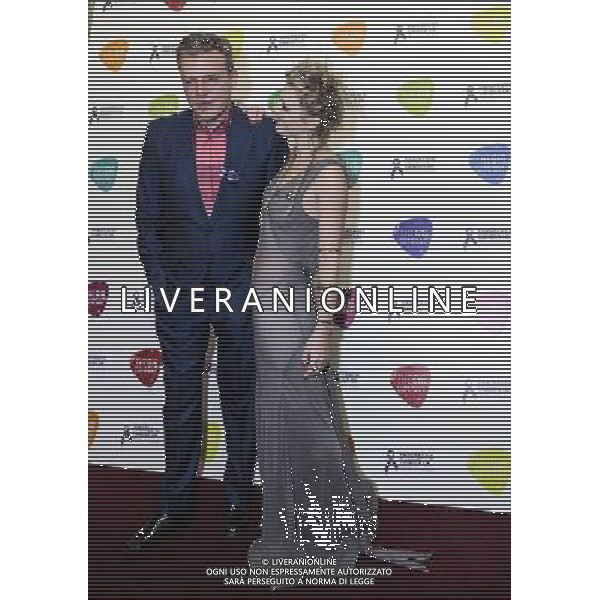 Suggs, Bo Bruce attend a photocall during an evening with Suggs and Friends at Porchester Hall on March 14, 2013 in London, England. The event to raise money for Pancreatic Cancer Research. His sister-in-law, and her aunt, sadly passed away as a result of the cancer very recently. /AGENZIA ALDO LIVERANI SAS/ITALY ONLY - EDITORIAL USE ONLY