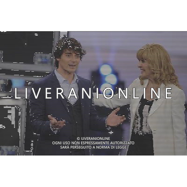 Roma - 06/04/2013 - Auditorium Rai - Trasmissione di Rai 1 \' Altrimetni ci Arrabbiamo \' condotta da Milly Carlucci - nella foto: Simone Corrente e Milly Carlucci Â© Fabrizio Corradetti - Ag. Aldo Liverani sas