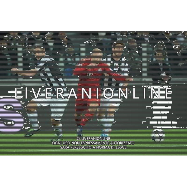 UEFA Champions League - Quarti di finale gara di ritorno Torino 10-04-2013 Juventus - Bayern Monaco nella foto Robben supera Chiellini e Marchisio foto Roberto Garavaglia - ag. Aldo Liverani