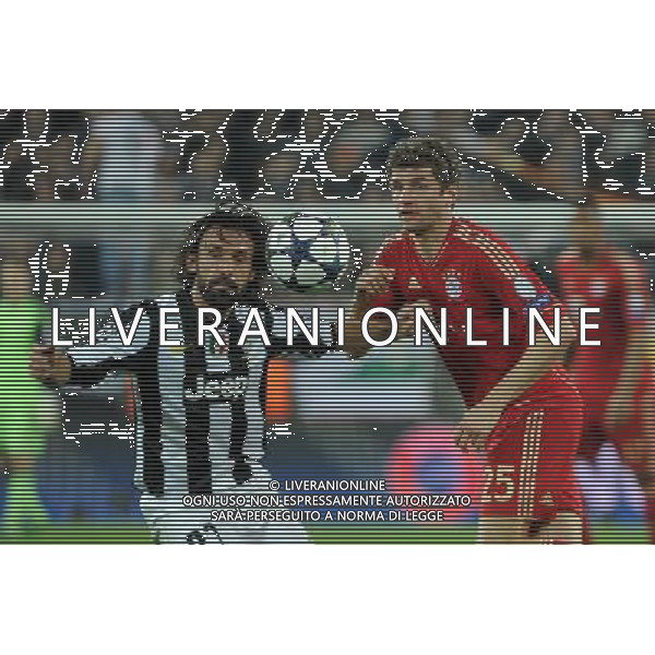 UEFA Champions League - Quarti di finale gara di ritorno Torino 10-04-2013 Juventus - Bayern Monaco nella foto Pirlo e Muller foto Roberto Garavaglia - ag. Aldo Liverani