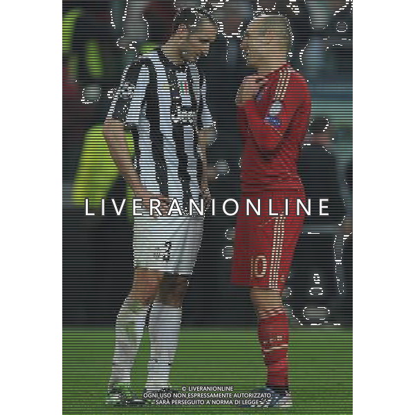 UEFA Champions League 2012/2013 Quarti di Finale Ritorno Torino - 10.04.2013 Juventus-Bayern Monaco Nella Foto:robben e chiellini a fine partita /Ph.Vitez-Ag. Aldo Liverani