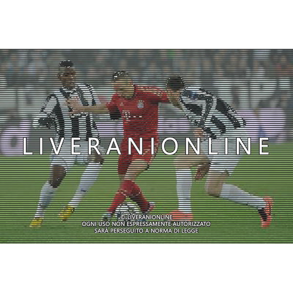 UEFA Champions League - Quarti di finale gara di ritorno Torino 10-04-2013 Juventus - Bayern Monaco nella foto Franck Ribery (Bayern Monaco) in mezzo tra Paul Pogba (Juventus) a SX e Andrea Barzagli (Juventus) a DX foto Roberto Garavaglia - ag. Aldo Liverani