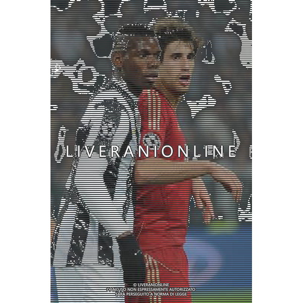 UEFA Champions League - Quarti di finale gara di ritorno Torino 10-04-2013 Juventus - Bayern Monaco nella foto Paul Pogba (Juventus) e sulla DX Javi Martinez (Bayern) foto Roberto Garavaglia - ag. Aldo Liverani