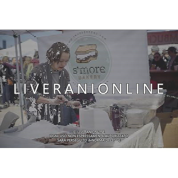 Foodies from around the city flock to opening day at the Smorgasburg in East River State Park in the Williamsburg neighborhood of Brooklyn in New York on Saturday, April 6, 2013. The marketplace features prepared and artisanal foods made in Brooklyn by small entrepreneurs. In the two years the market has been in operation it has provided a venue for numerous chefs and cooks to sell their wares, some of whom have grown into large successful businesses. (å Frances M. Roberts) ©photoshot/AGENZIA ALDO LIVERANI SAS - ITALY ONLY - La vita quotidiana della popolazione di Williamsburg, Brooklyn, New York 6 Aprile 2013.