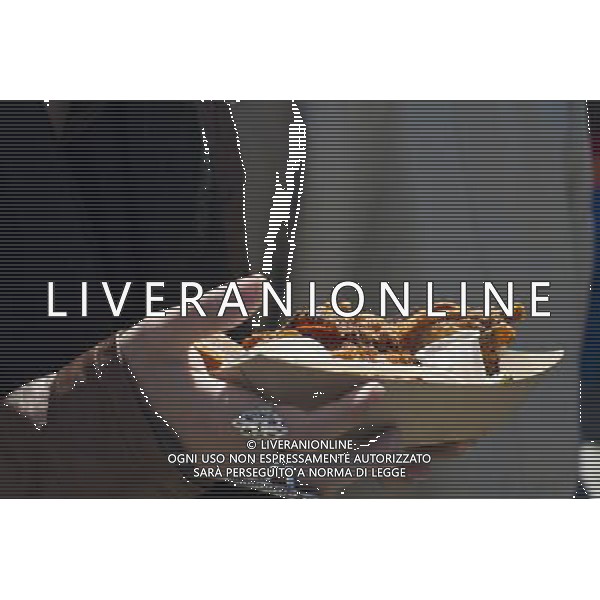 Foodies from around the city flock to opening day at the Smorgasburg in East River State Park in the Williamsburg neighborhood of Brooklyn in New York on Saturday, April 6, 2013. The marketplace features prepared and artisanal foods made in Brooklyn by small entrepreneurs. In the two years the market has been in operation it has provided a venue for numerous chefs and cooks to sell their wares, some of whom have grown into large successful businesses. (å Frances M. Roberts) ©photoshot/AGENZIA ALDO LIVERANI SAS - ITALY ONLY - La vita quotidiana della popolazione di Williamsburg, Brooklyn, New York 6 Aprile 2013.