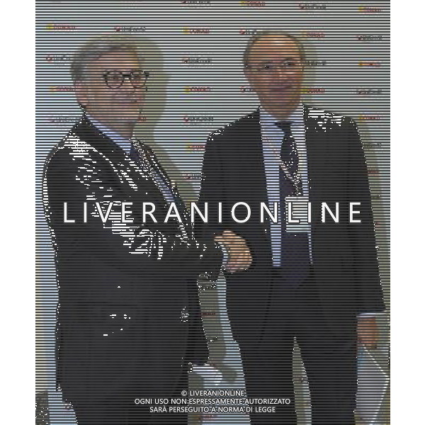 MILANO 22/4/2013 AUDITORIUM TESTORI. PALAZZO LOMBARDIA PRESENTAZIONE DELL\' ACCORDO TRA UNICREDIT E CONAD PER I PAGAMENTI A FAVORE DEI FORNITORI DEL GRUPPO DISTRIBUTIVO NELLA FOTO FRANCESCO PUGLIESE E FEDERICO GHIZZONI FOTO ROMANO/AG ALDO LIVERANI S.A.S.