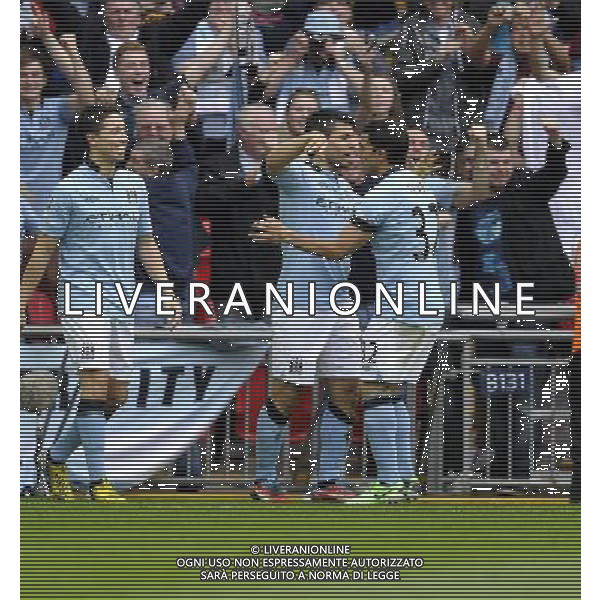 Sergio Aguero (L) celebrates his goal with Carlos Tevez of Manchester City of Manchester City.Chelsea v Manchester City.English FA Cup Semi Final,.Wembley Stadium. London. UK..14/4/13,.photo: Sean Ryan / IPS Photo Agency.. mobile: 07971 400 939.Address: Thatched Cottage,Wretham,.Thetford, Norfolk IP24 1RH .Office tel: 01953 499 403... AG ALDO LIVERANI S A S ONLY ITALY