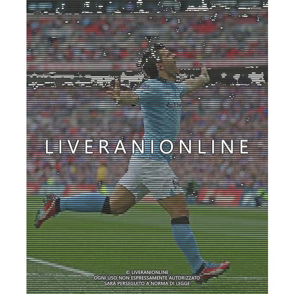 Manchester City\'s Sergio Aguero is celebrating his goal with co-scorer Manchester City\'s Samir Nasri during the Semifinal of the 2013 FA Cup between Manchester City and Chelsea FC at the Wembley Stadium in London ; Referee: Christopher Foy; on 14/04/2013. Picture by Marcello Pozzetti , ©IPS Photo Agency.Thatched Cottage - Wretham - Thetford .Norfolk IP24 1RH - .TEL 01953 499403. -Personal mobile: 07973 308 835 . AG ALDO LIVERANI S A S ONLY ITALY