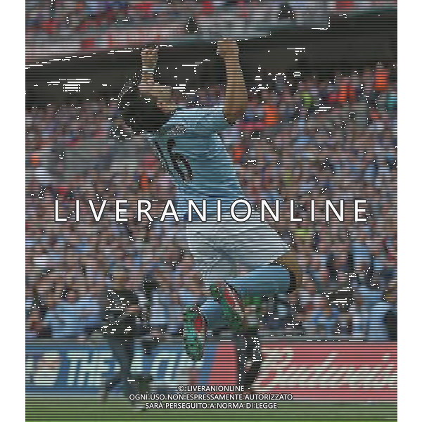 Manchester City\'s Sergio Aguero is celebrating his goal with co-scorer Manchester City\'s Samir Nasri during the Semifinal of the 2013 FA Cup between Manchester City and Chelsea FC at the Wembley Stadium in London ; Referee: Christopher Foy; on 14/04/2013. Picture by Marcello Pozzetti , ©IPS Photo Agency.Thatched Cottage - Wretham - Thetford .Norfolk IP24 1RH - .TEL 01953 499403. -Personal mobile: 07973 308 835 . AG ALDO LIVERANI S A S ONLY ITALY