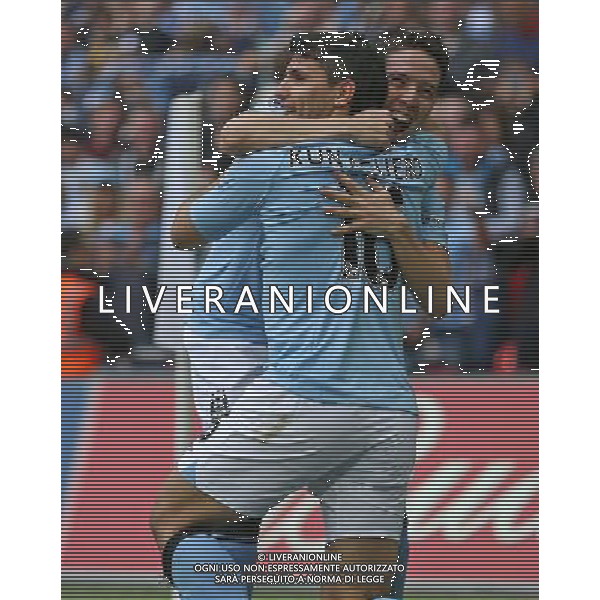 Manchester City\'s Sergio Aguero is celebrating his goal with co-scorer Manchester City\'s Samir Nasri during the Semifinal of the 2013 FA Cup between Manchester City and Chelsea FC at the Wembley Stadium in London ; Referee: Christopher Foy; on 14/04/2013. Picture by Marcello Pozzetti , ©IPS Photo Agency.Thatched Cottage - Wretham - Thetford .Norfolk IP24 1RH - .TEL 01953 499403. -Personal mobile: 07973 308 835 . AG ALDO LIVERANI S A S ONLY ITALY