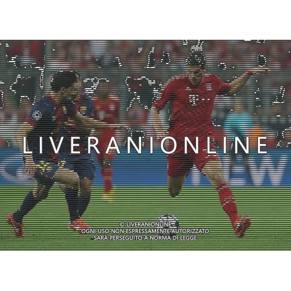 firo FuÃŸball, Fussball, 23.04.2013 Uefa Champions League, CL Saison 2012/2013 Halbfinale, Hinspiel FCB FC Bayern MÃ¼nchen, Muenchen - FC Barcelona 4:0 FCB Mario GÃ³mez Gomez, Zweikampf Duell, Barca Bartra $worldrights Es gelten unsere AGB, einsehbar auf www.firosportphoto.de copyright by firo sportphoto: Coesfelder Str.207 48249 DÃ¼lmen www.firosportphoto.de mail@firosportphoto.de (V o l k s b a n k B o c h u m - W i t t e n ) BLZ.: 430 601 29 Kt. Nr.: 341 117 100 Tel:Â  02594 - 9916004 Fax:Â 02594 - 9916005 AG ALDO LIVERANI S A S ONLY ITALY